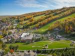 a view showing blue mountain in autumn, with views toward the activities, the ski runs and showing some of the village area.