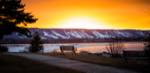 a vibrant sunset captured from near sunset point park looking toward the terminals and the ski runs at blue mountain