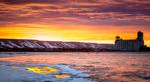 a vibrant sunset captured from near sunset point park looking toward the terminals and the ski runs at blue mountain