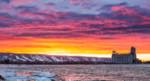 a vibrant sunset captured from near sunset point park looking toward the terminals and the ski runs at blue mountain